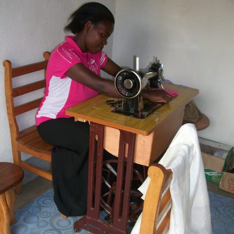 Lady using a sewing machine